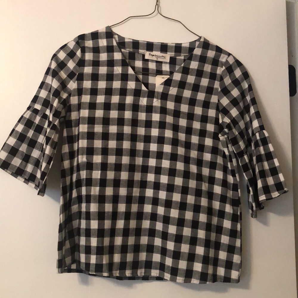 Black and white check top.